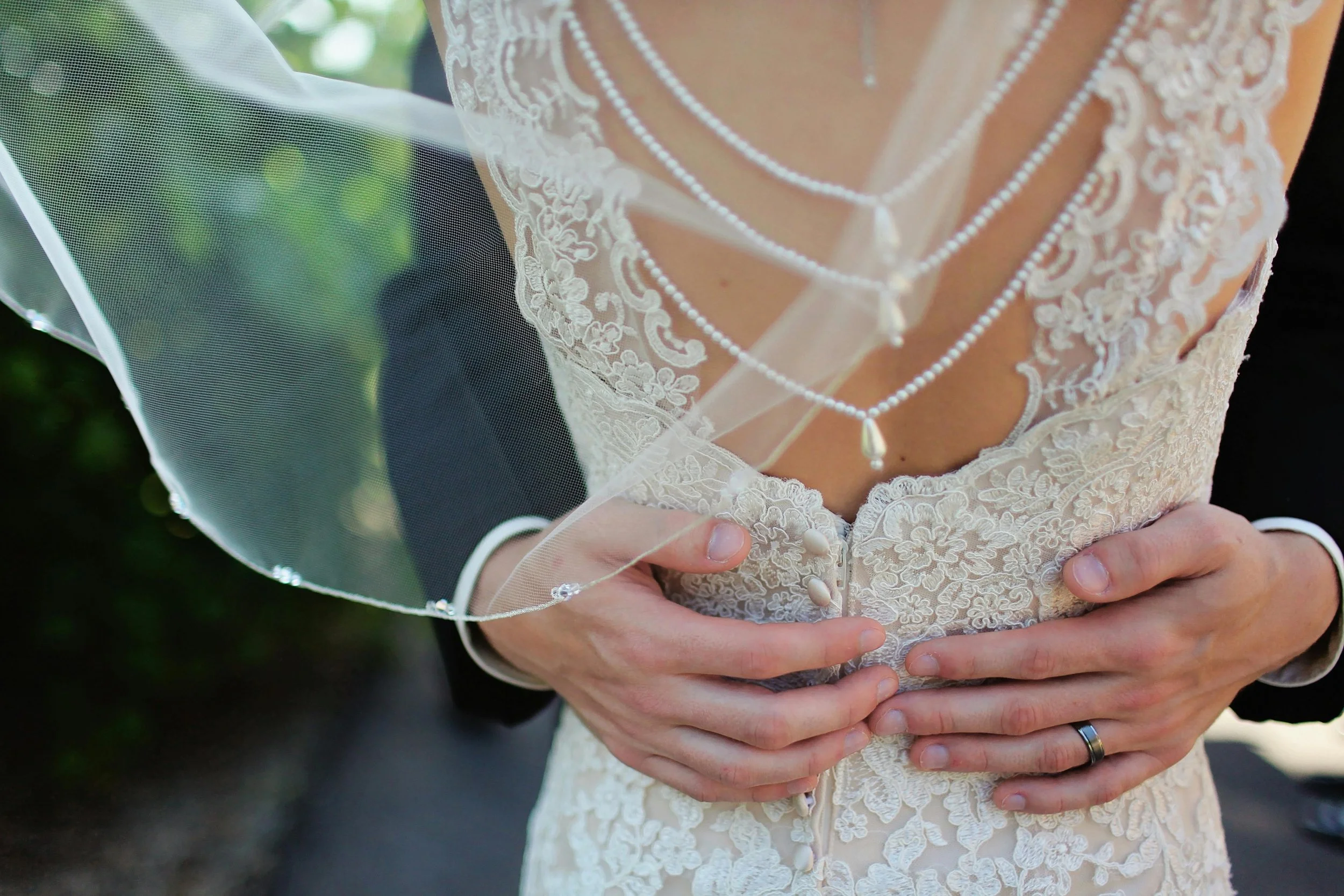 Bride and groom embracing